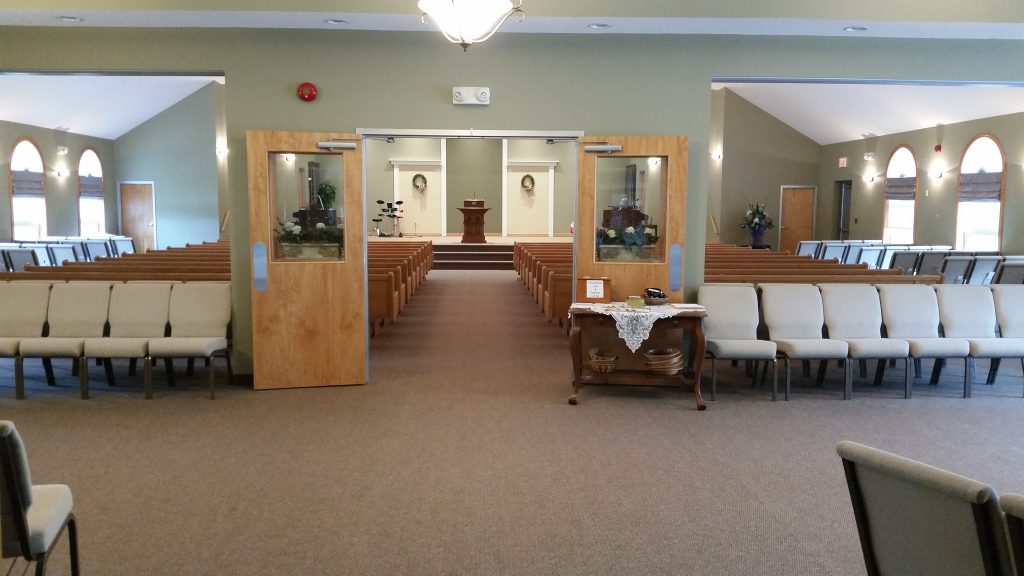 Looking from the foyer to the front of the Sanctuary